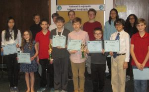Group of Eagle Hill students holding certificates.