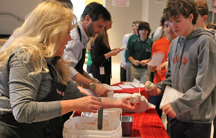 This is an image of students being served ice cream