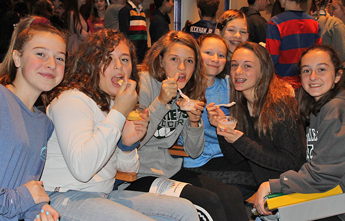 This is an image of a group of girls smiling