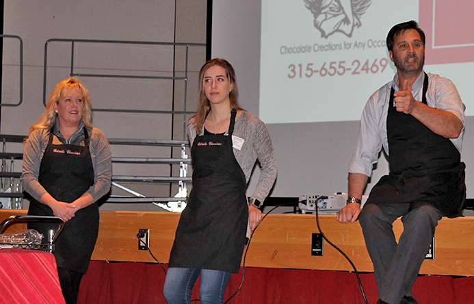 This is an image of the members of Gabrielle's Ice Cream leadership team talking to students