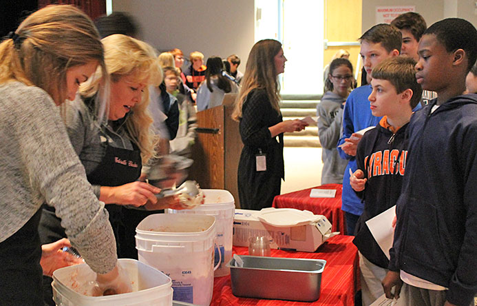 This is an image of students being served ice cream