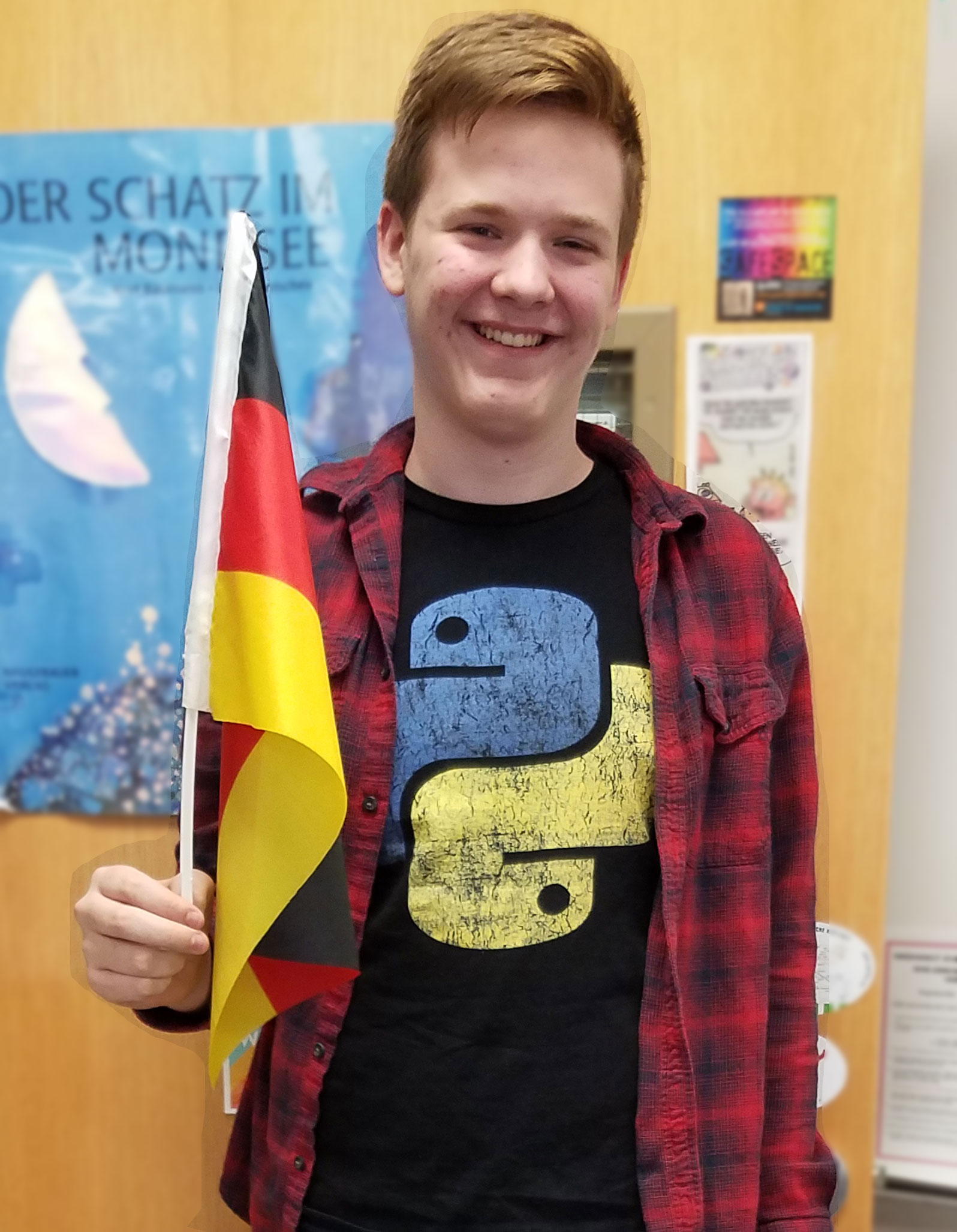 This is an image of Daniel Popp holding a German flag