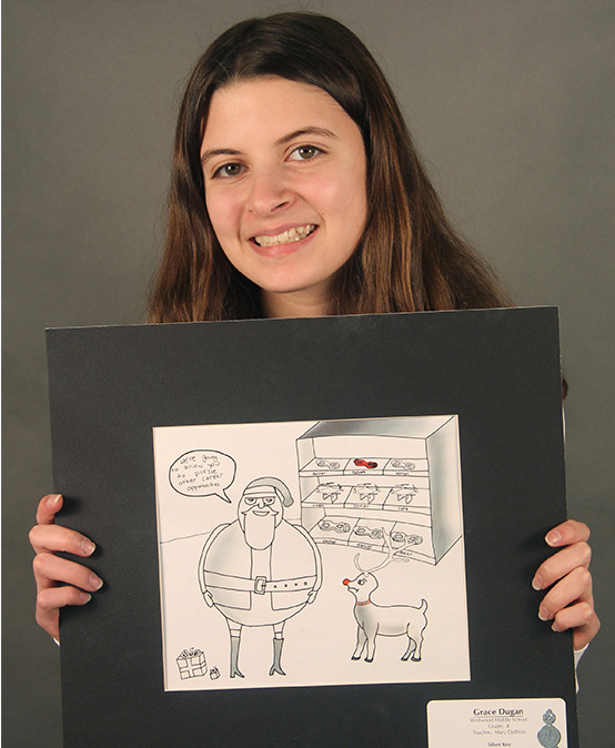 This is an image of an F-M student holding her artwork