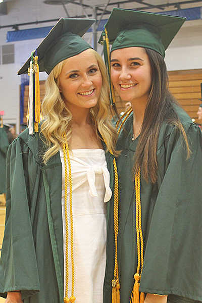 This is an image of two female students at graduation