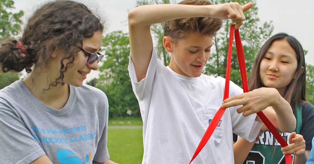 This is an image of three students working together