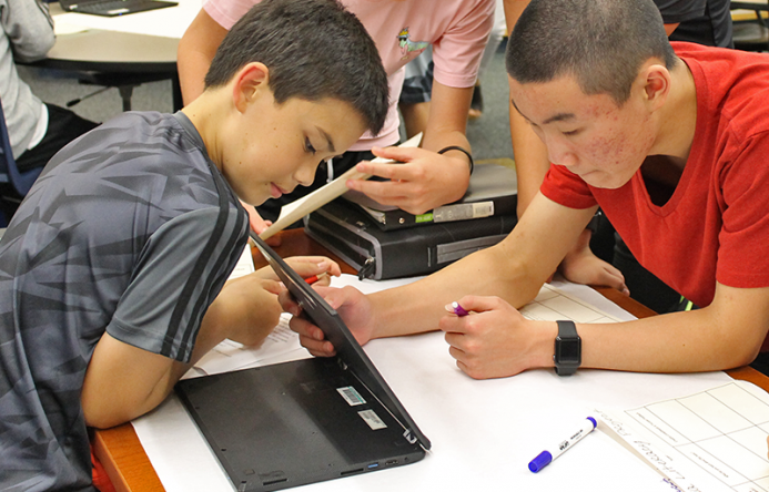 This is an image of two students working together