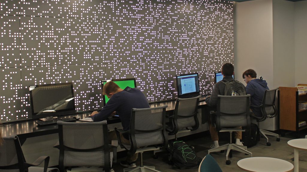 This is an image of students working on computers