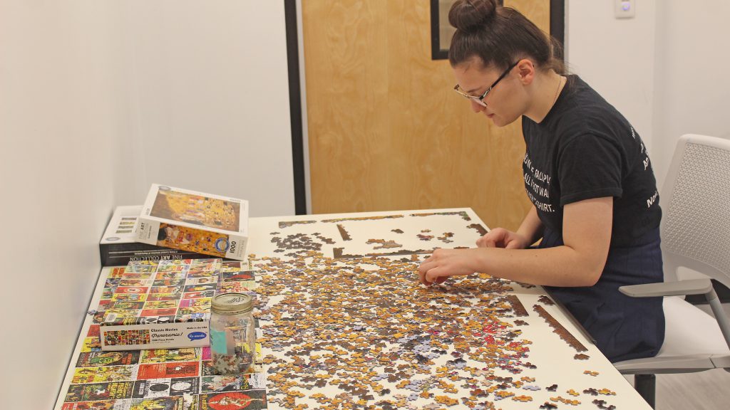 This is an image of a student working on a puzzle