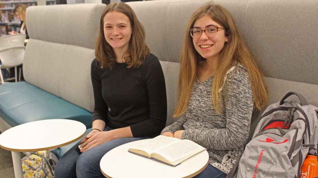 This is an image of two students sitting together