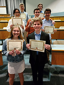 This is an image of German students standing together and holding certificates