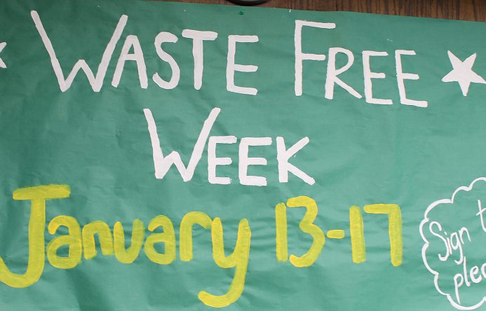 Hand painted ssign that says Waste Free Week, January 13-17; sign the pledge