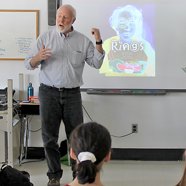 This is a photo of a former professor talking to students