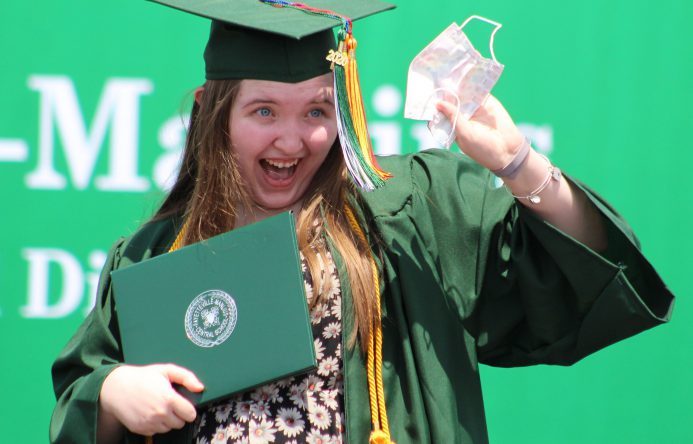 This is an image of a graduate smiling