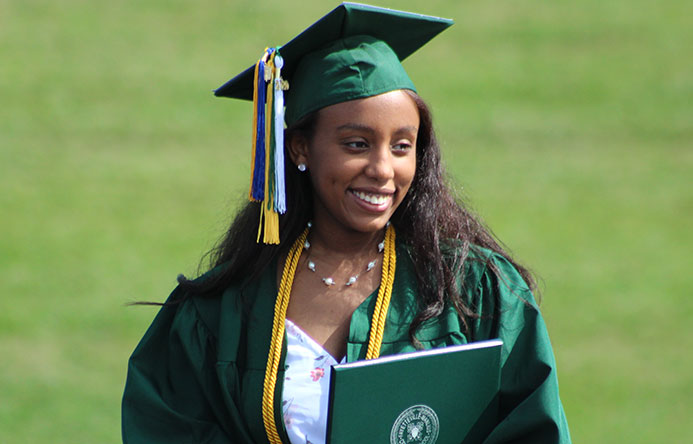 This is an image of a graduate smiling