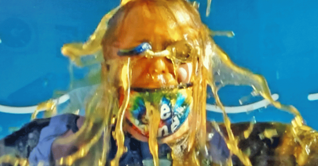 This is an image of Enders Road principal Deborah Capri getting slimed.