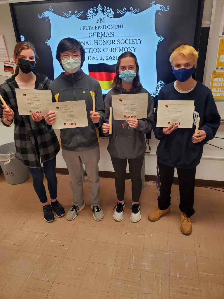 This is an image of four F-M High School students standing together.