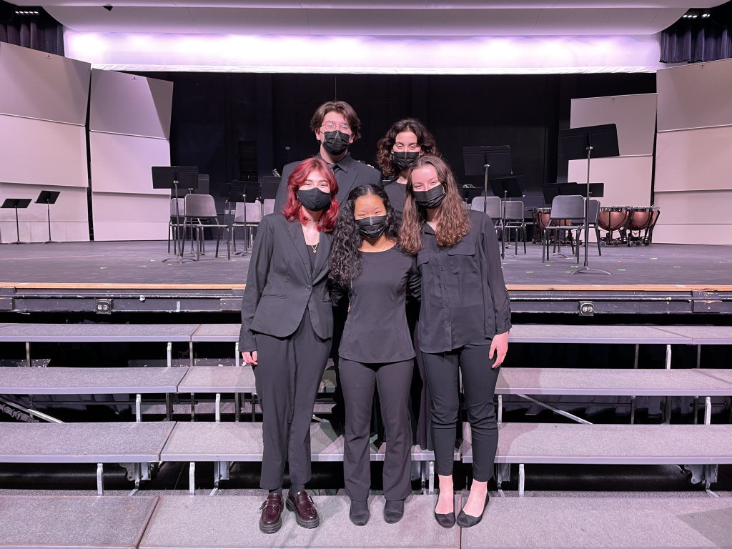 This is an image of five students standing together 