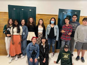 8th grade English class dressed up for Outsiders Day