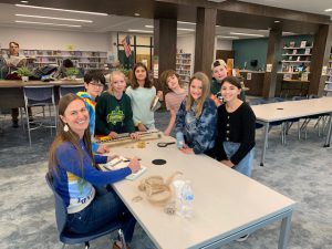 Wellwood students attend a book signing session with Dusti Bowling.