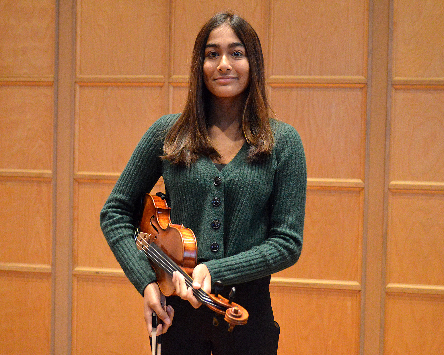 Shreya Bhattacharya holds her instrument
