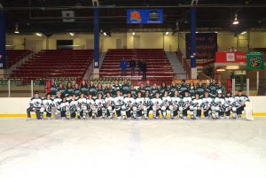 The F-M boys varsity ice hockey team and their guests of honor.