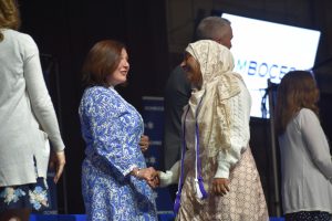 F-M’s Khalada Khatun, a graduate of the physical therapy professions program, shakes hands with Emily Behan, Assistant Director of Career & Technical Education and Innovative Education at OCM BOCES