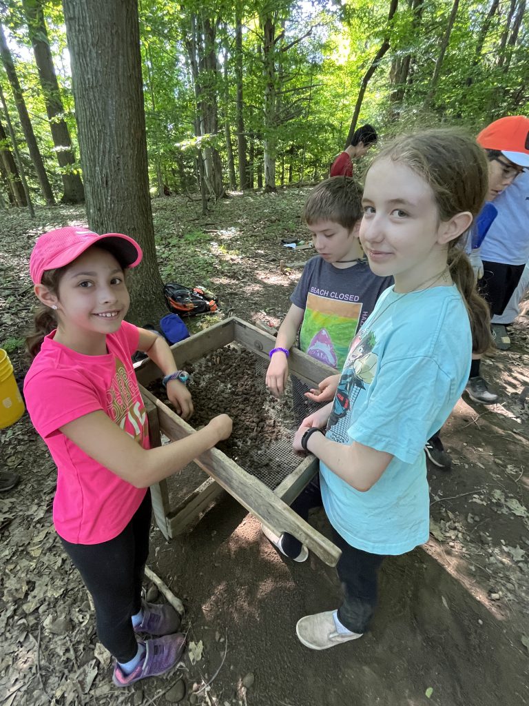 Middle school students participate in Archaeology Camp during July of 2023.