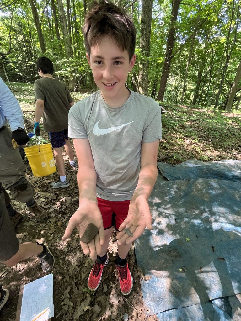 Middle school students participate in Archaeology Camp during July of 2023.