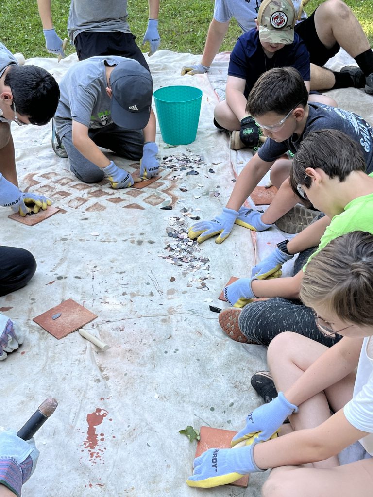 Middle school students participate in Archaeology Camp during July of 2023.