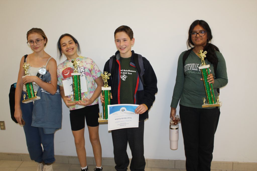 Avya Mangla, Sven Chiroiu-Gozman, Adalyn Thibodeaux, and Madeline Howes Hanlin advance to the online Regional Spelling Bee.