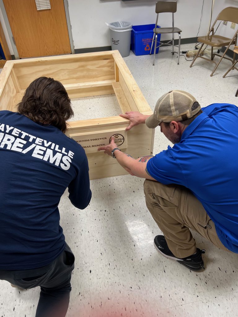 FMHS technology students work together to build equipment for Friends Forever Animal Rescue.