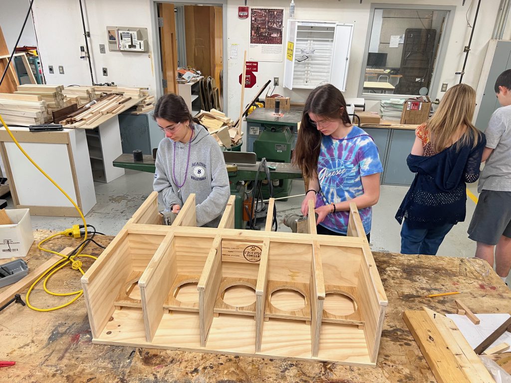 FMHS technology students work together to build equipment for Friends Forever Animal Rescue.