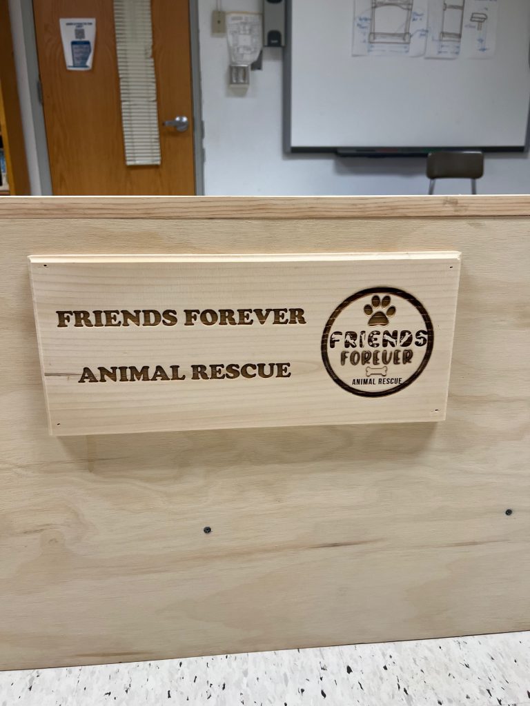 FMHS technology students work together to build equipment for Friends Forever Animal Rescue.