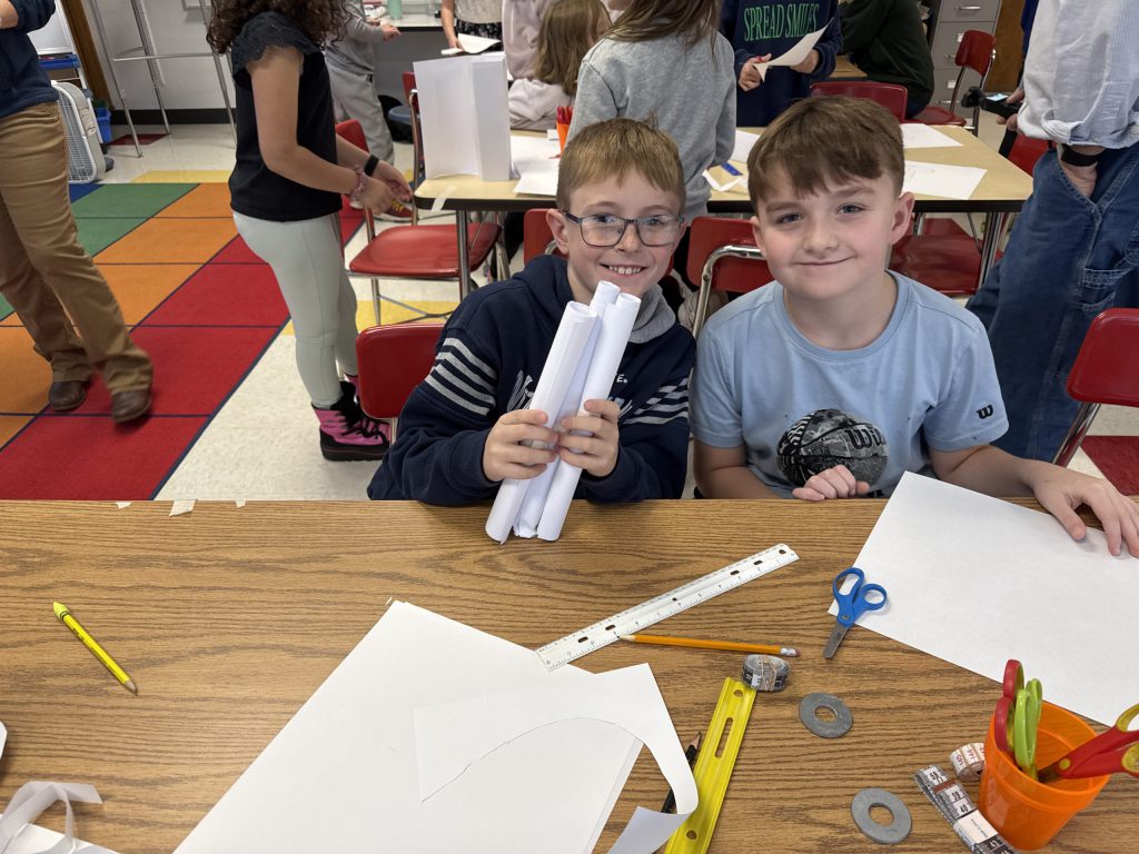 Third graders at Fayetteville Elementary build structures out of paper for an engineering challenge.