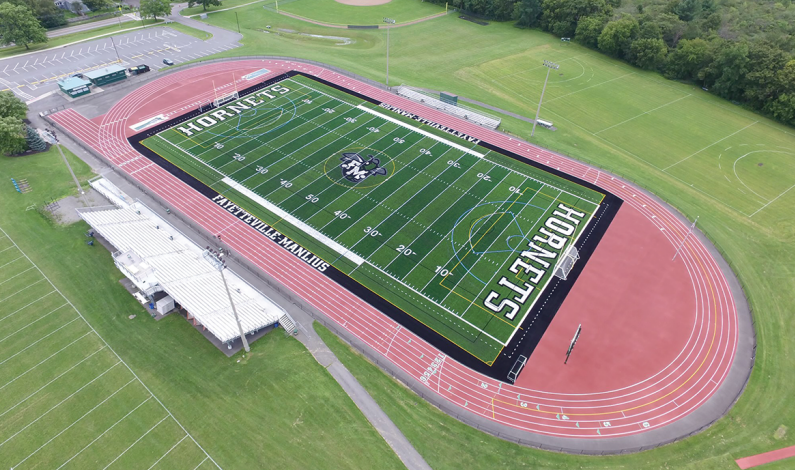 A birds eye view of the athletic field which says "Hornets" in the grass.
