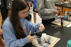 Student works on art project