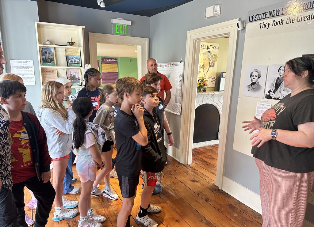 Students walk through the Stickley Museum.
