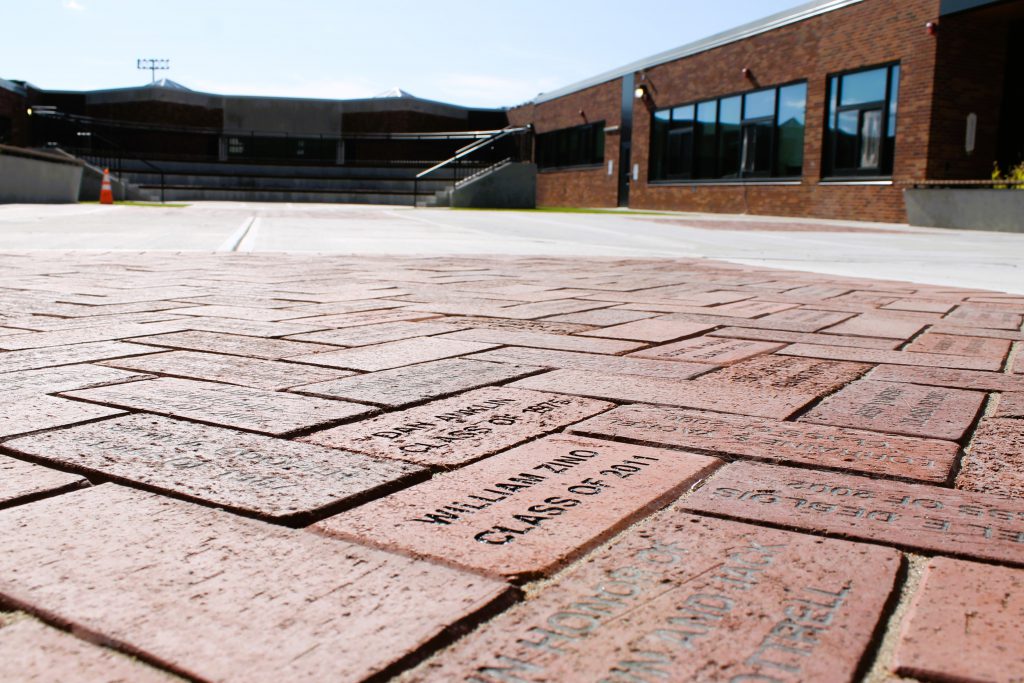 close-up of engraved bricks in the courtyard