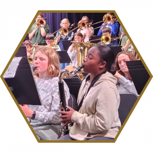 students performing in a band ensemble