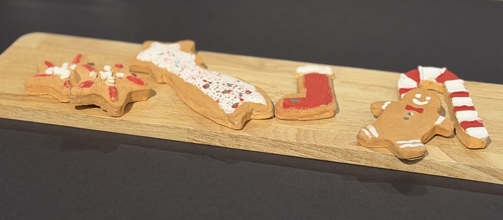Holiday cookie sculptures: Christmas stocking, candy cane and a gingerbread man