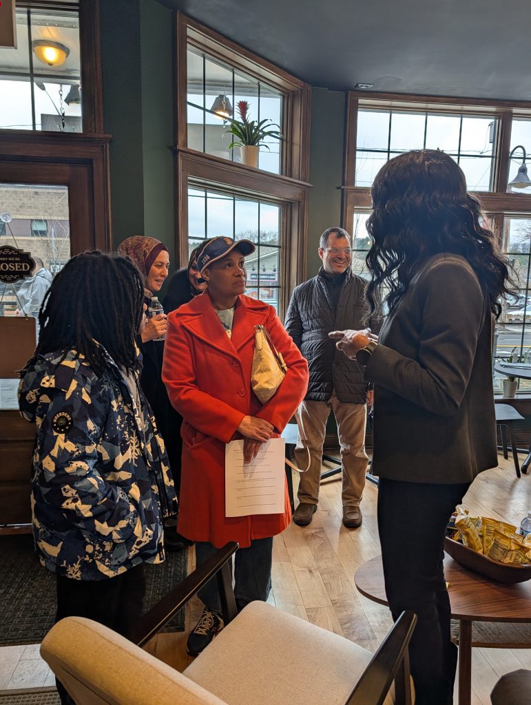 Dr. Parvey speaks with several members of the community at local book shop.